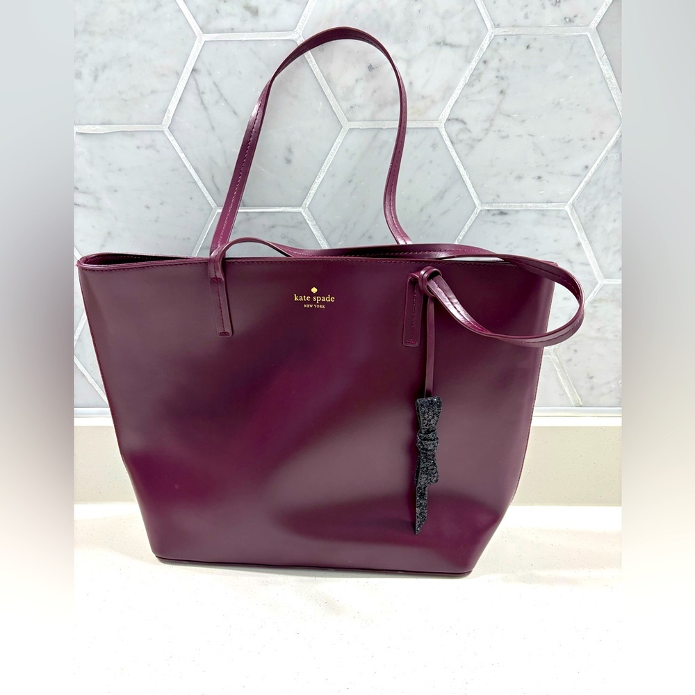 Kate Spade Schuyler Tote Bag in burgundy red color